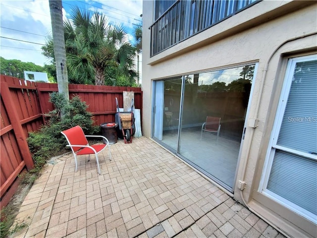 2763 Woodgate Ln Unit 105, Sarasota, FL 34231 - fenced backyard with a patio area