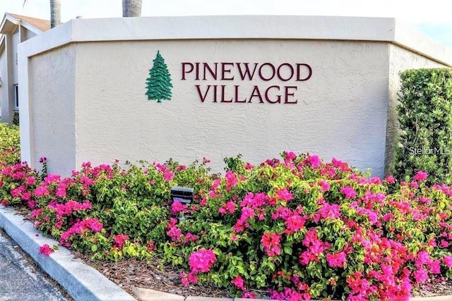 2763 Woodgate Ln Unit 105, Sarasota, FL 34231 - view of community / neighborhood sign