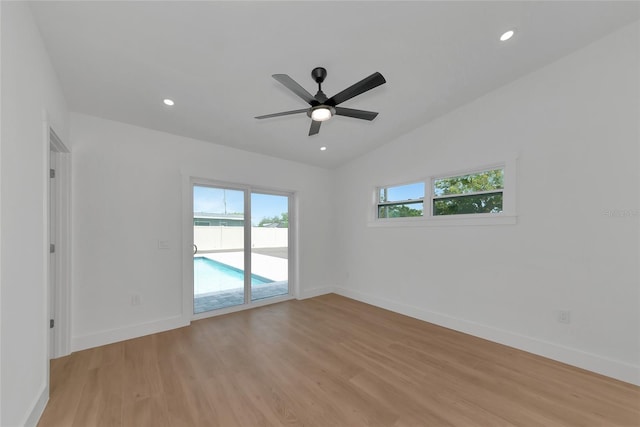 4515 19th Ave W, Bradenton, FL 34209 - spare room with light wood-type flooring, ceiling fan, recessed lighting, and vaulted ceiling