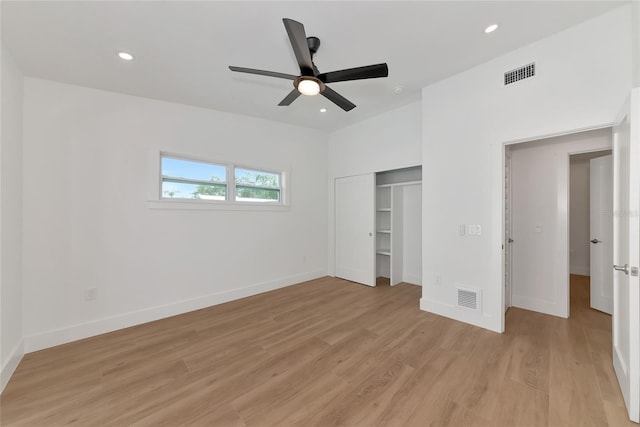 4515 19th Ave W, Bradenton, FL 34209 - unfurnished bedroom with light wood-type flooring, a closet, recessed lighting, and a ceiling fan