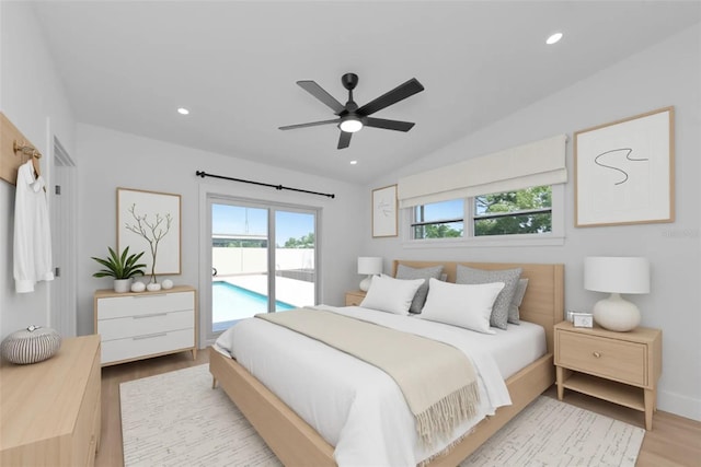 4515 19th Ave W, Bradenton, FL 34209 - bedroom featuring access to exterior, wood finished floors, vaulted ceiling, recessed lighting, and a ceiling fan