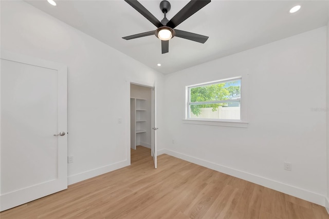 4515 19th Ave W, Bradenton, FL 34209 - unfurnished bedroom with light wood finished floors, recessed lighting, and a ceiling fan