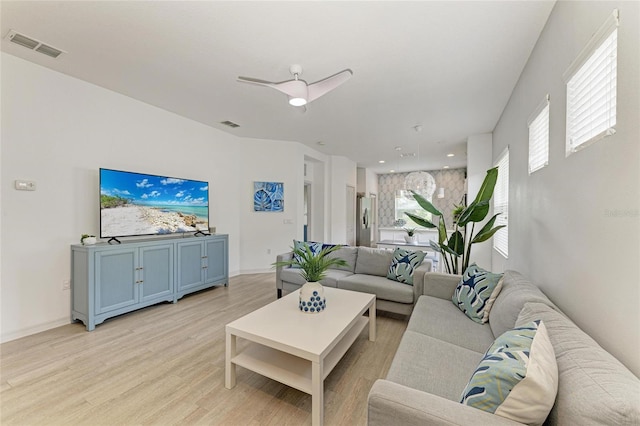 11431 Piedmont Park Xing, Bradenton, FL 34211 - living room with light wood-type flooring and a ceiling fan