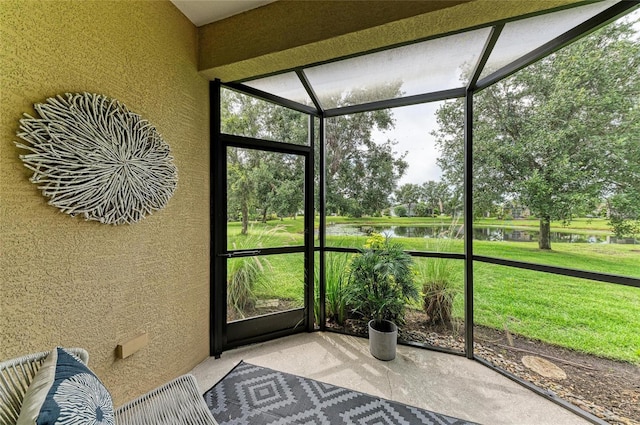 11431 Piedmont Park Xing, Bradenton, FL 34211 - unfurnished sunroom with a water view and view of scattered trees