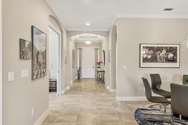 5596 Cantucci St, Nokomis, FL 34275 - corridor with arched walkways, crown molding, and recessed lighting