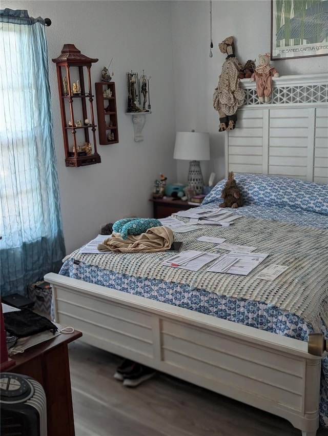 5231 Brassy Loop, North Port, FL 34287 - bedroom featuring wood finished floors