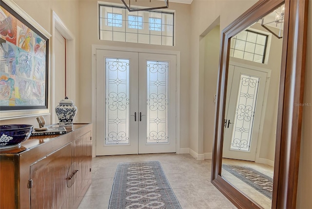 7638 Windy Hill Cv, Bradenton, FL 34202 - entrance foyer featuring french doors and light tile patterned floors