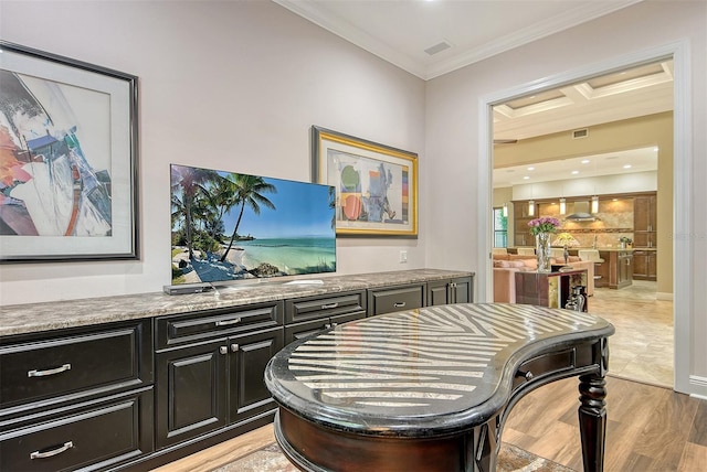 7638 Windy Hill Cv, Bradenton, FL 34202 - bar area featuring ornamental molding and light wood finished floors