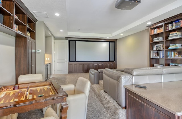 7638 Windy Hill Cv, Bradenton, FL 34202 - cinema featuring light colored carpet, a raised ceiling, and recessed lighting