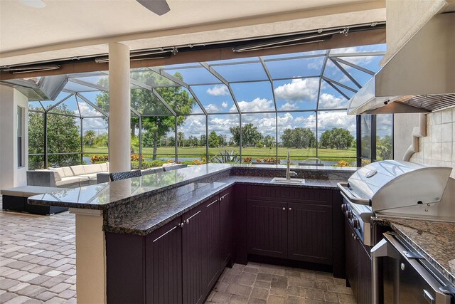 7638 Windy Hill Cv, Bradenton, FL 34202 - view of patio / terrace featuring area for grilling, glass enclosure, and a ceiling fan