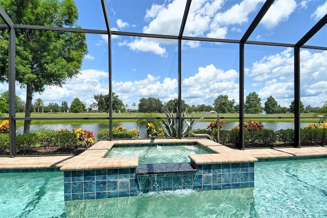 7638 Windy Hill Cv, Bradenton, FL 34202 - view of swimming pool with a water view, glass enclosure, a pool with connected hot tub, and view of scattered trees