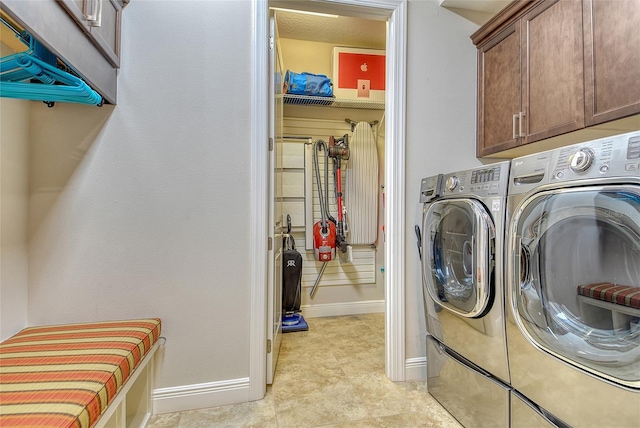 7638 Windy Hill Cv, Bradenton, FL 34202 - laundry room featuring cabinet space and independent washer and dryer