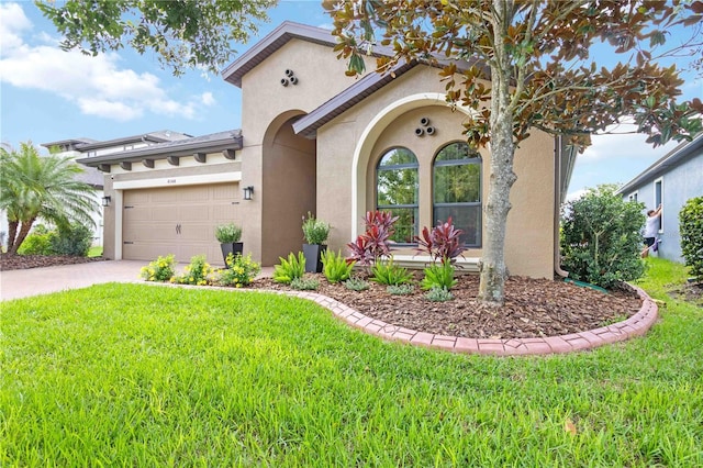4044 Wisdom Trl, Land O Lakes, FL 34638 - mediterranean / spanish-style house with stucco siding, a front yard, and a garage