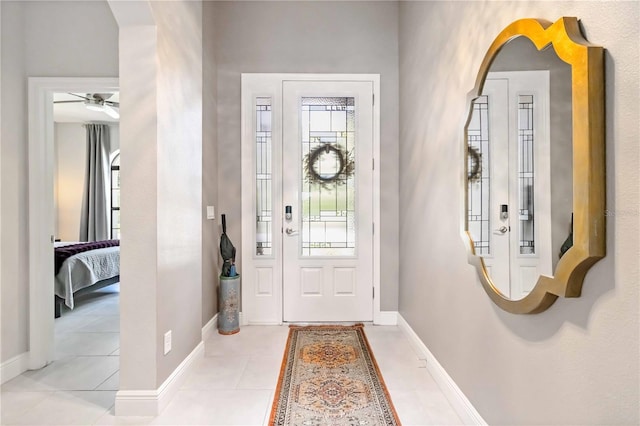 4044 Wisdom Trl, Land O Lakes, FL 34638 - entrance foyer featuring healthy amount of natural light, a ceiling fan, and tile patterned floors