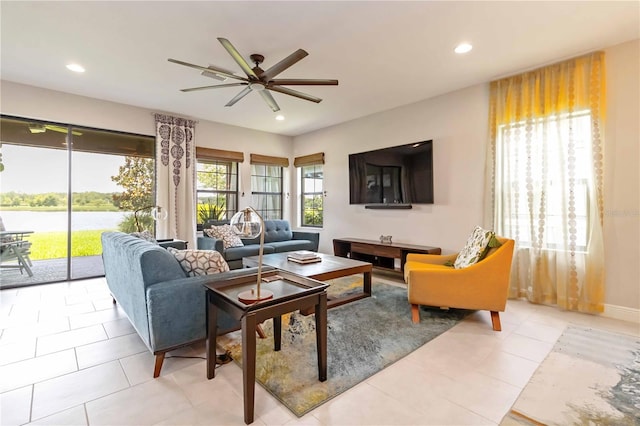 4044 Wisdom Trl, Land O Lakes, FL 34638 - living room featuring a ceiling fan, recessed lighting, a water view, and light tile patterned floors