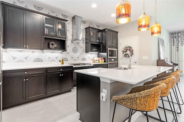 4044 Wisdom Trl, Land O Lakes, FL 34638 - kitchen featuring appliances with stainless steel finishes, a kitchen breakfast bar, glass insert cabinets, light countertops, and light tile patterned floors