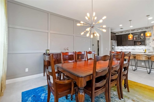 4044 Wisdom Trl, Land O Lakes, FL 34638 - dining area with light tile patterned floors and a chandelier