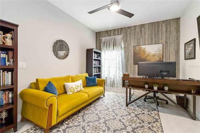 4044 Wisdom Trl, Land O Lakes, FL 34638 - office space with ceiling fan, an accent wall, wood walls, and tile patterned flooring