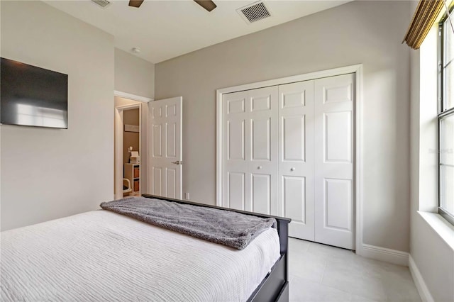 4044 Wisdom Trl, Land O Lakes, FL 34638 - bedroom featuring a closet, light tile patterned flooring, and ceiling fan