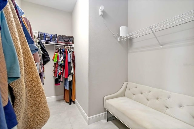 4044 Wisdom Trl, Land O Lakes, FL 34638 - walk in closet with tile patterned flooring