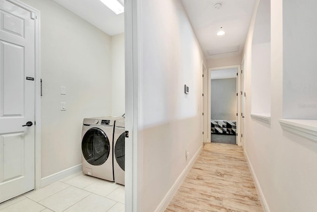 9215 Isabella Cir, Parrish, FL 34219 - laundry area featuring washing machine and dryer and baseboards