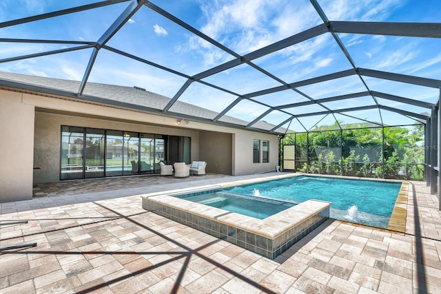 9215 Isabella Cir, Parrish, FL 34219 - view of pool featuring a patio area, a pool with connected hot tub, and a lanai