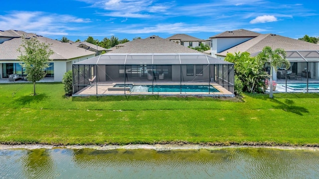 9215 Isabella Cir, Parrish, FL 34219 - rear view of property with an outdoor pool, a patio, glass enclosure, and a lawn