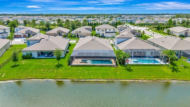 9215 Isabella Cir, Parrish, FL 34219 - aerial view of residential area featuring a pool area and a nearby body of water