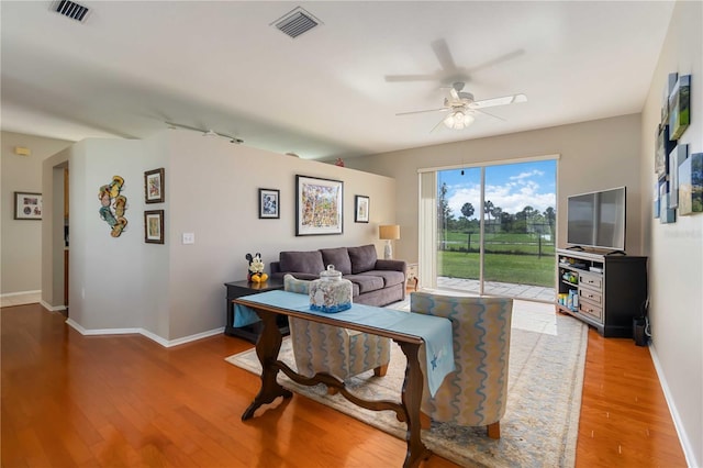 9410 71st Ave E, Palmetto, FL 34221 - living area featuring a ceiling fan and wood finished floors