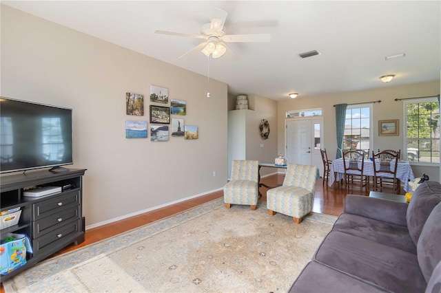 9410 71st Ave E, Palmetto, FL 34221 - living area featuring wood finished floors and ceiling fan