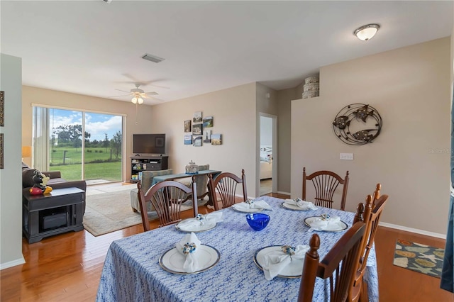 9410 71st Ave E, Palmetto, FL 34221 - dining space featuring wood finished floors and ceiling fan