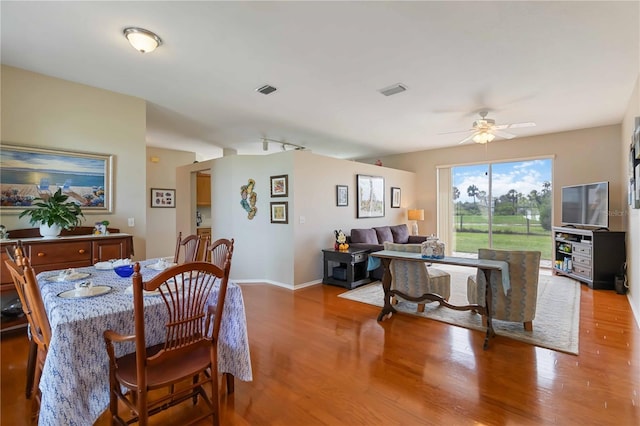 9410 71st Ave E, Palmetto, FL 34221 - dining room with wood finished floors and ceiling fan