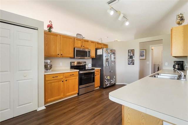 9410 71st Ave E, Palmetto, FL 34221 - kitchen featuring stainless steel appliances, light countertops, and dark wood-style flooring