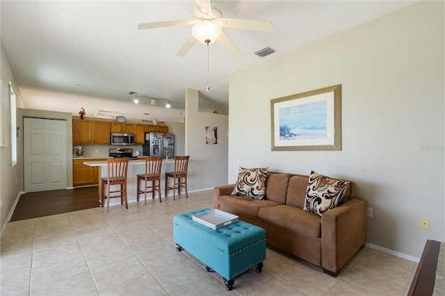 9410 71st Ave E, Palmetto, FL 34221 - living room with light tile patterned floors and ceiling fan