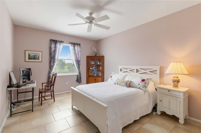 9410 71st Ave E, Palmetto, FL 34221 - bedroom featuring light tile patterned floors and a ceiling fan
