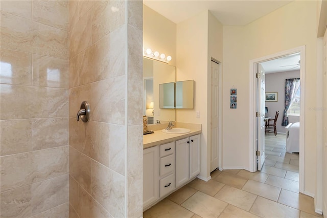 9410 71st Ave E, Palmetto, FL 34221 - full bath featuring vanity, tile patterned flooring, tiled shower, and ensuite bathroom