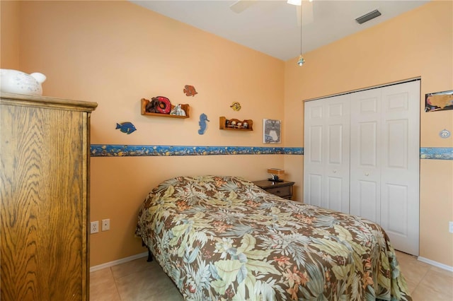9410 71st Ave E, Palmetto, FL 34221 - tiled bedroom with a closet and ceiling fan