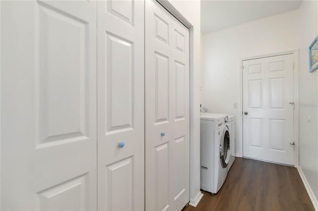 9410 71st Ave E, Palmetto, FL 34221 - washroom featuring separate washer and dryer and dark wood-style floors