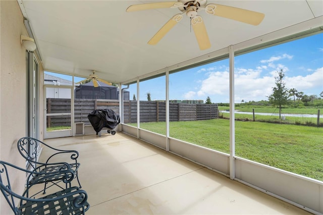 9410 71st Ave E, Palmetto, FL 34221 - unfurnished sunroom with ceiling fan