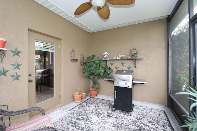 2819 47th St E, Palmetto, FL 34221 - home office featuring a ceiling fan and a textured wall
