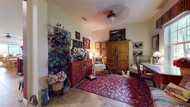 2819 47th St E, Palmetto, FL 34221 - home office featuring a ceiling fan, healthy amount of natural light, and tile patterned flooring