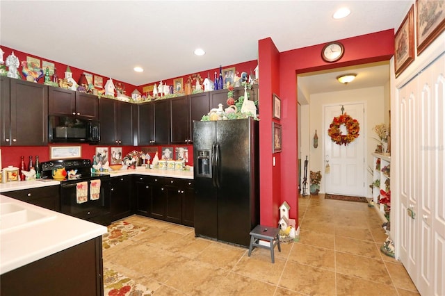 2819 47th St E, Palmetto, FL 34221 - kitchen with black appliances, light countertops, recessed lighting, and dark brown cabinetry