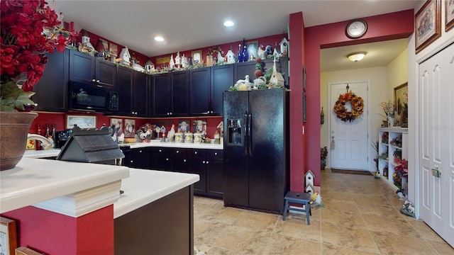 2819 47th St E, Palmetto, FL 34221 - kitchen featuring black appliances, light countertops, a peninsula, and recessed lighting