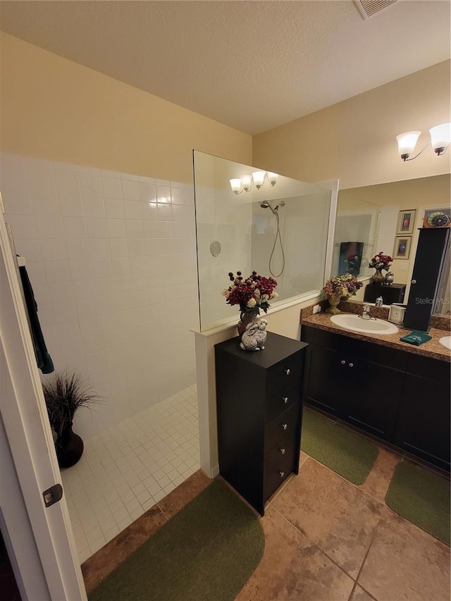 2819 47th St E, Palmetto, FL 34221 - full bathroom featuring vanity, walk in shower, and tile patterned flooring