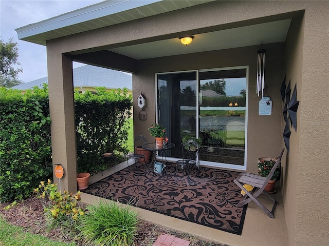 2819 47th St E, Palmetto, FL 34221 - property entrance featuring stucco siding