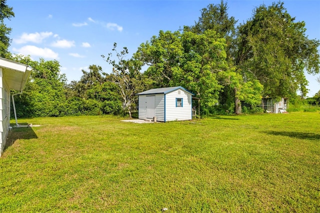 3020 51st Ave E, Bradenton, FL 34203 - view of grassy yard featuring a storage unit