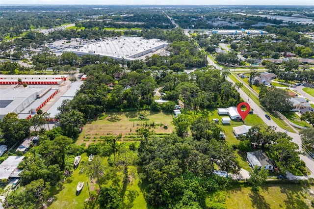3020 51st Ave E, Bradenton, FL 34203 - aerial overview of property's location with a tree filled landscape