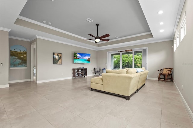 18050 Wooden Skiff Ct, Nokomis, FL 34275 - living area with a tray ceiling, a ceiling fan, ornamental molding, light tile patterned flooring, and recessed lighting