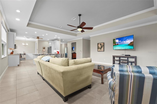 18050 Wooden Skiff Ct, Nokomis, FL 34275 - living area with a tray ceiling, ceiling fan, light tile patterned floors, recessed lighting, and crown molding
