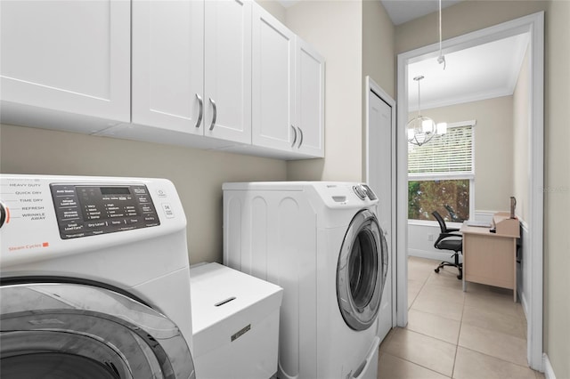 18050 Wooden Skiff Ct, Nokomis, FL 34275 - laundry area featuring washing machine and dryer, cabinet space, light tile patterned flooring, a desk, and a chandelier